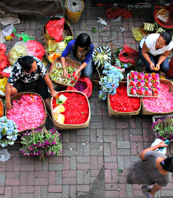 Buying items at Ubud Market in Bali, Indonesia